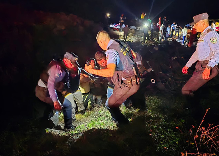 Rescue workers on site after tragic plane crash near remote island, involving at least twelve including a popular singer. Rescue workers on site after tragic plane crash near remote island, involving at least twelve including a popular singer.