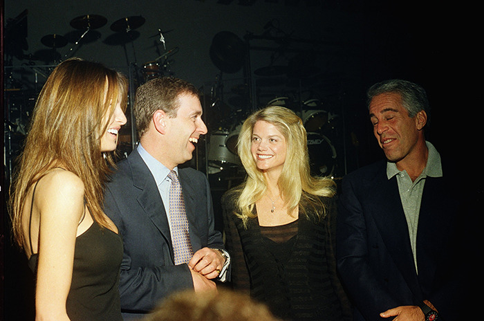 Group of four people at an event, smiling and talking. Group of four people at an event, smiling and talking.