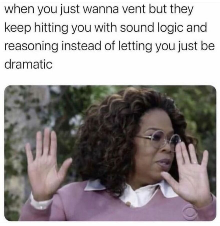A woman with curly hair and glasses raises her hands in a humorous meme about logic and drama.