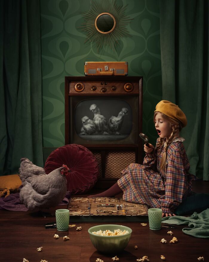 Childhood magic captured through a lens: a girl with a magnifying glass, vintage TV, and a chicken, surrounded by toys and popcorn.