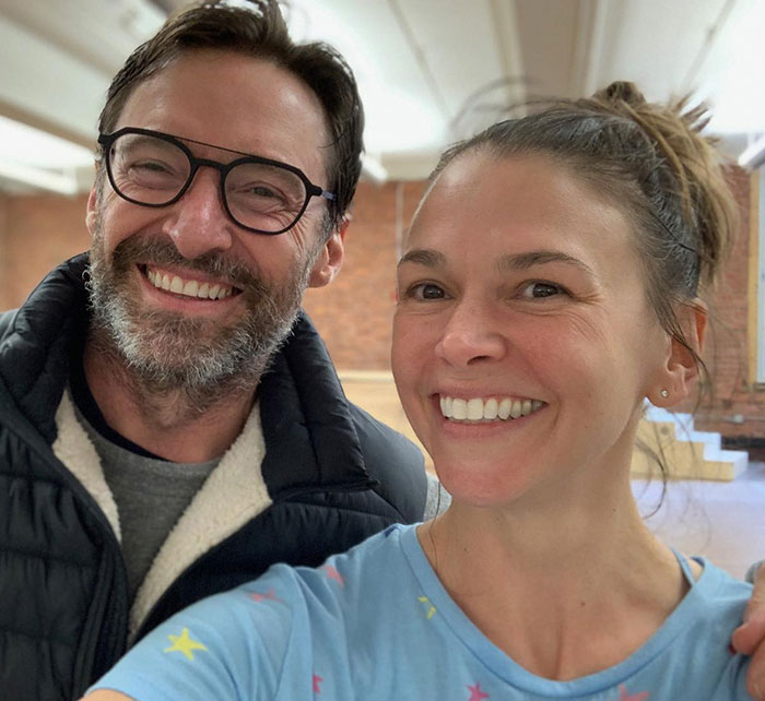 Smiling man in glasses and woman in a casual setting, related to Hugh Jackman and Deborra-Lee Furness’ divorce news. Smiling man in glasses and woman in a casual setting, related to Hugh Jackman and Deborra-Lee Furness’ divorce news.