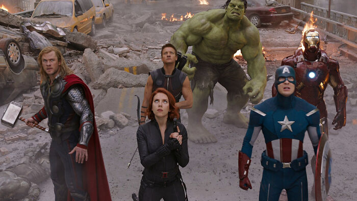 Superheroes standing together in a city scene depicting things that lived up to expectations.