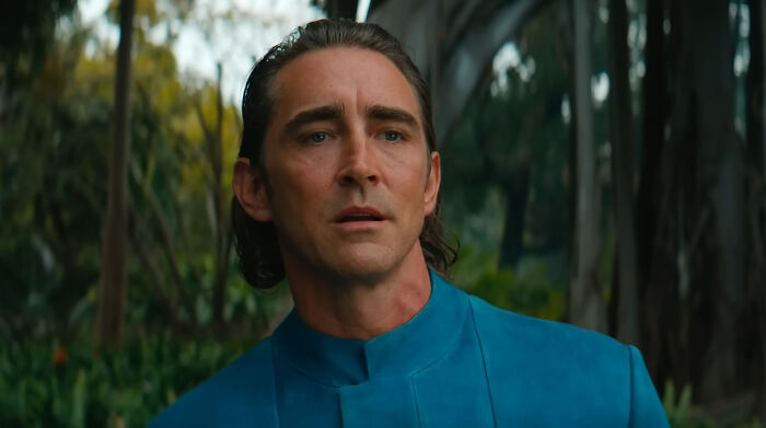 Person in a blue shirt stands outdoors, representing celebrities admired by netizens.