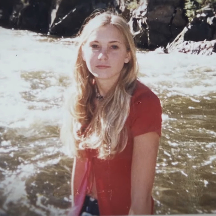 Young woman with long hair in front of a river, related to Prince Andrew's accuser. Young woman with long hair in front of a river, related to Prince Andrew's accuser.