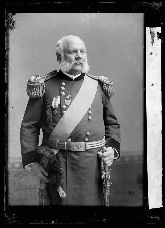 Portrait of a decorated military officer from rare photographs rescued from old glass negatives in history restored collection.