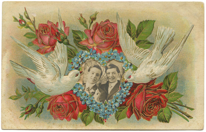 Colorful vintage illustration featuring two white doves and red roses around a heart-shaped photo of a smiling couple.