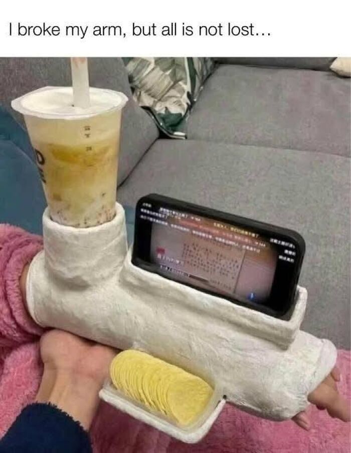 Creative dad joke showing a broken arm cast holding drink, phone, and snacks demonstrating funny dad joke posts humor.