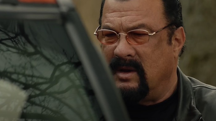 Man with a goatee and glasses, appearing tense, reflecting on Hollywood casting mistakes.