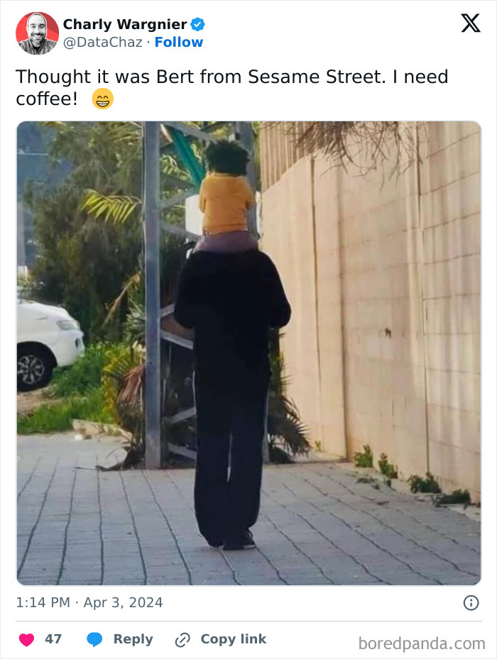 A relatable meme comparing a child on shoulders to Bert from Sesame Street.