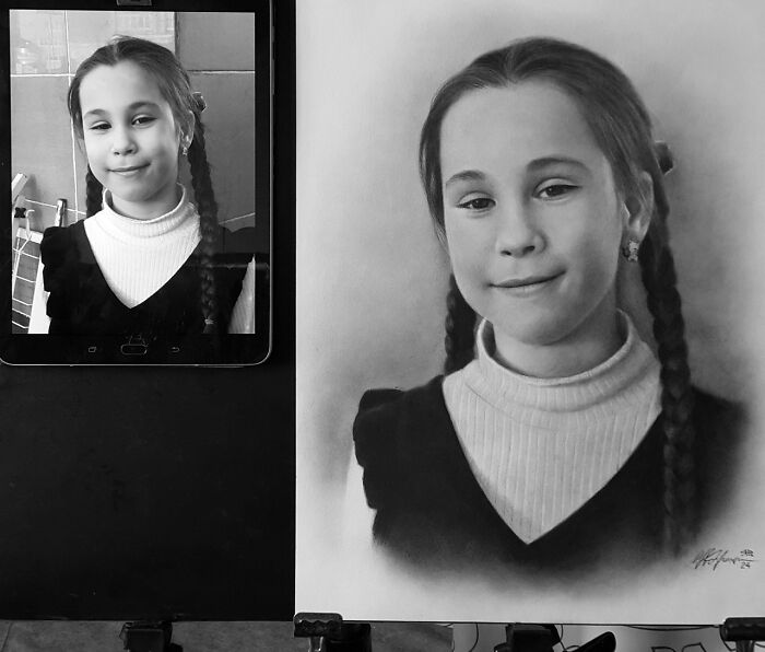 Hyper-realistic pencil portrait of a girl with braided hair, next to her original photo on a tablet.
