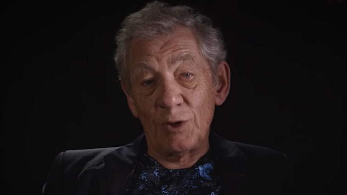 Elderly man in a dark setting, discussing casting mistakes in Hollywood.