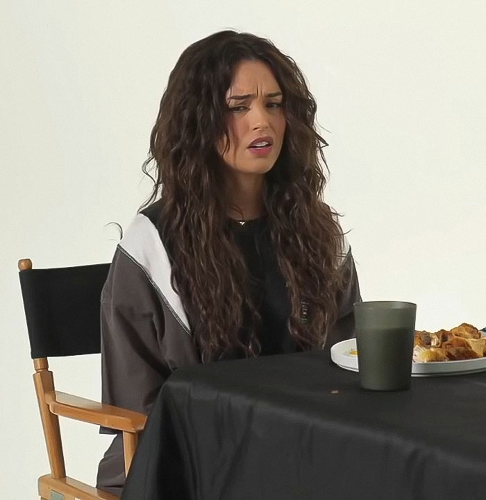 Streamer looking confused while sitting at a table with food, discussing Minecraft scene cut involving Jason Momoa. Streamer looking confused while sitting at a table with food, discussing Minecraft scene cut involving Jason Momoa.