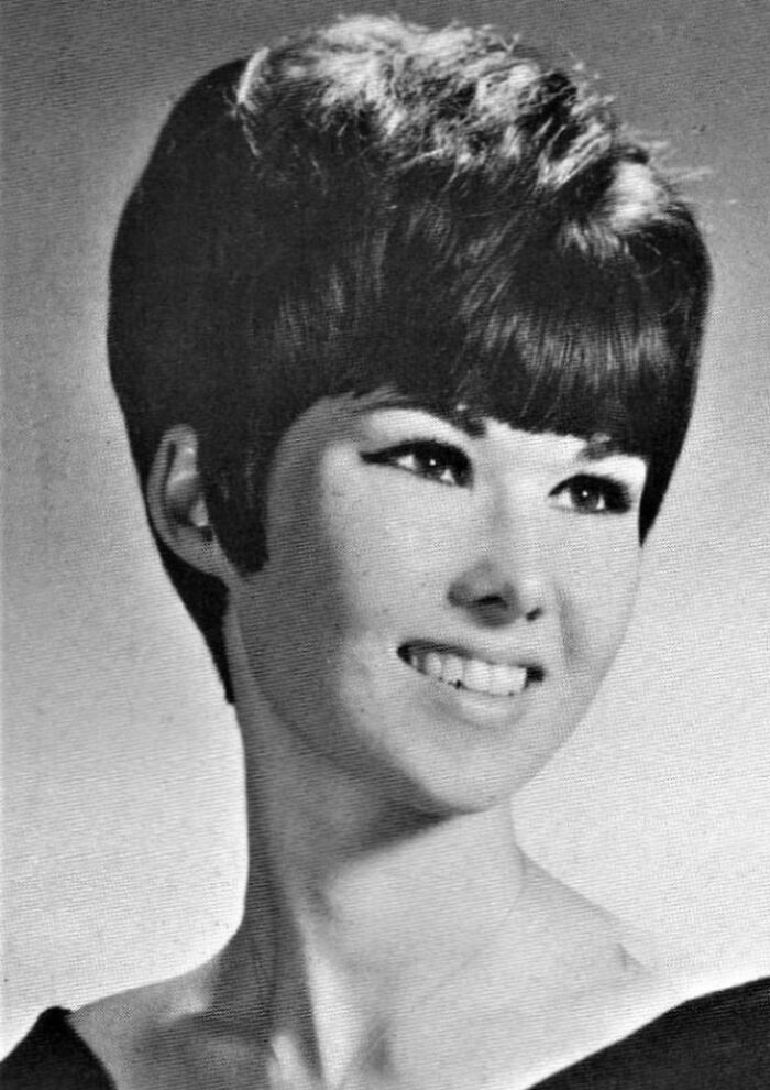 Vintage hairstyle showcasing a chic, voluminous pixie cut from yesteryear.