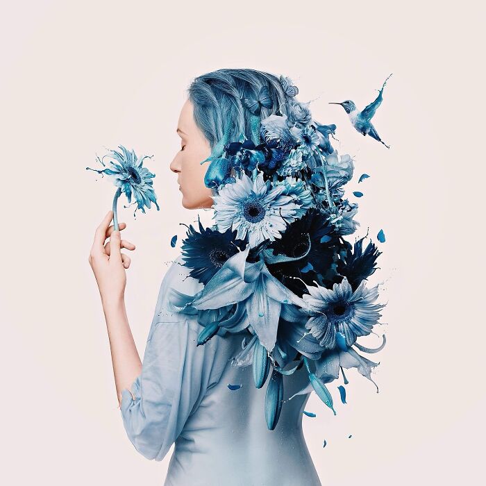 Surreal self-portrait of an artist with blue flowers and a hummingbird, blending Photoshop creativity and dreams.