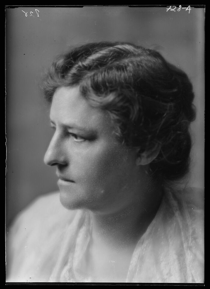 Black and white rare photograph of a woman in profile rescued from historic glass negatives collection.