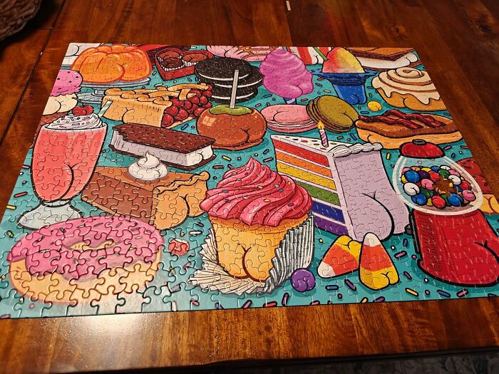 Colorful completed puzzle featuring various sweets and desserts, a playful Mother's Day gifts concept illustration.
