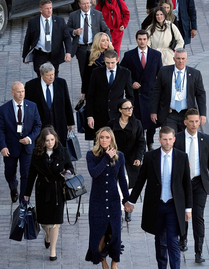 Group including Secret Service ensuring safety on campus. Group including Secret Service ensuring safety on campus.
