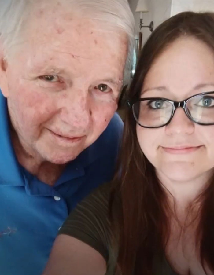 Elderly man in blue shirt and woman with glasses smiling, related to fertility fraud issue. Elderly man in blue shirt and woman with glasses smiling, related to fertility fraud issue.