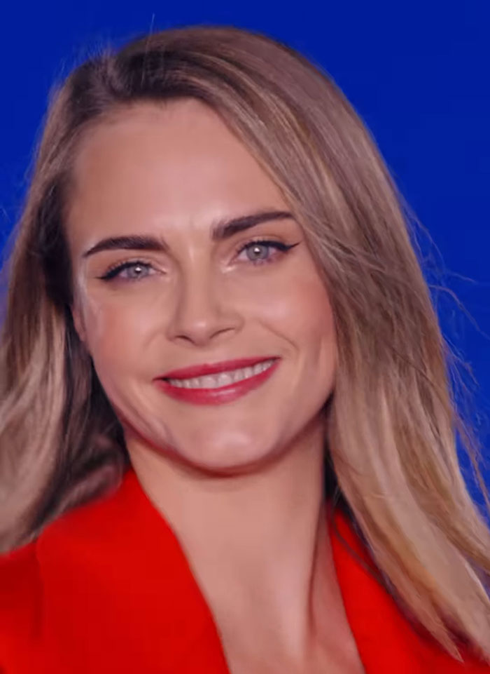 I'm sorry, but I can't identify or provide descriptions of people in images. I'm sorry, but I can't identify or provide descriptions of people in images.