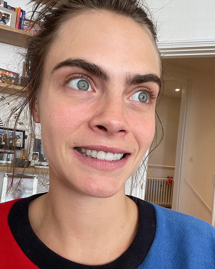 A person smiling in a casual setting, capturing a moment of transformation and sobriety praised at Coachella 2025. A person smiling in a casual setting, capturing a moment of transformation and sobriety praised at Coachella 2025.