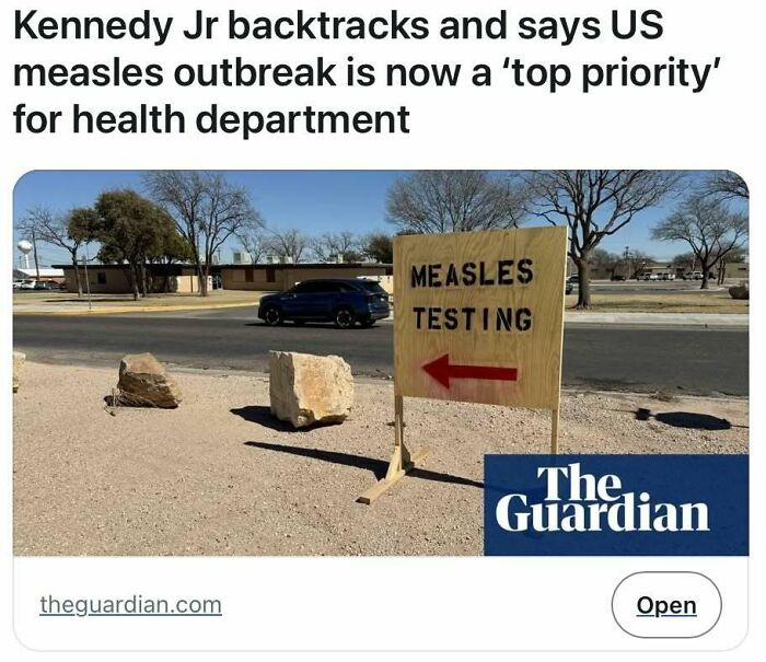 Measles testing sign on roadside with trees in background, emphasizing a top health department priority in the US.