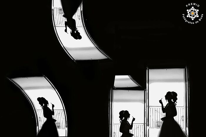 Silhouetted bride reflections in artistic black-and-white, featured in 2025 Premios FDB wedding photos.