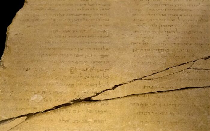 Ancient written text on aged parchment, showcasing some of the world's oldest surviving scripts.
