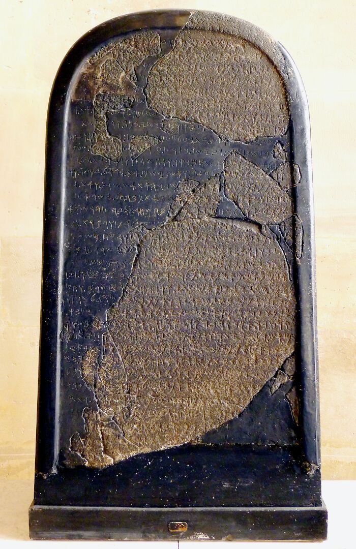 Ancient stone tablet with surviving old script featuring one of the world's oldest written texts.