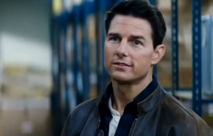 Actor in a warehouse wearing a leather jacket, highlighting casting mistakes in Hollywood.