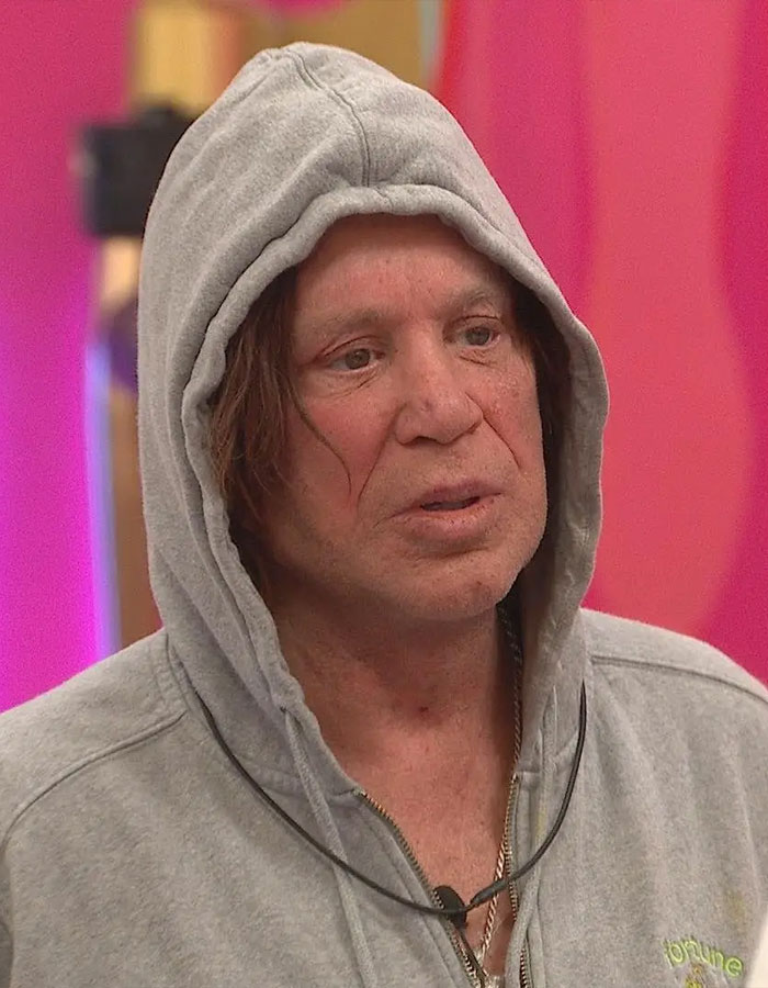 Actor in a gray hoodie during a moment from 'Celebrity Big Brother,' related to controversial comments. Actor in a gray hoodie during a moment from 'Celebrity Big Brother,' related to controversial comments.