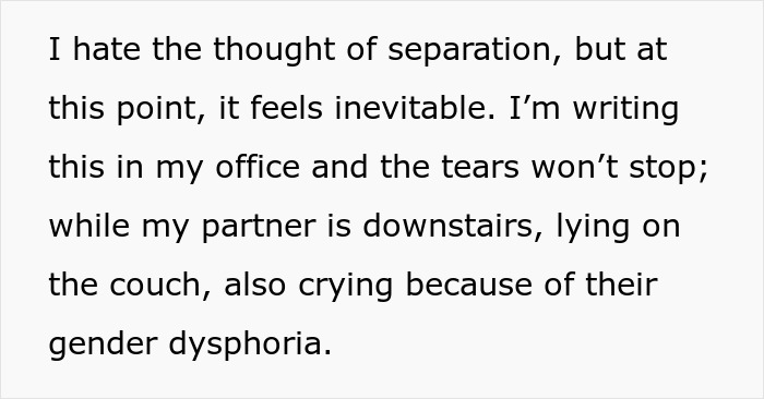 Person writing in an office, emotional while dealing with partner’s gender dysphoria after wife came out as trans. Person writing in an office, emotional while dealing with partner’s gender dysphoria after wife came out as trans.