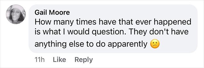 Comment questioning the detention of Black woman for walking on road, with skeptical emoji. Comment questioning the detention of Black woman for walking on road, with skeptical emoji.