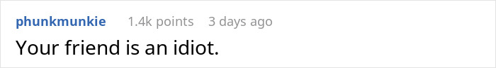 Screenshot of a social media comment saying Your friend is an idiot in a simple black and white text format. Screenshot of a social media comment saying Your friend is an idiot in a simple black and white text format.