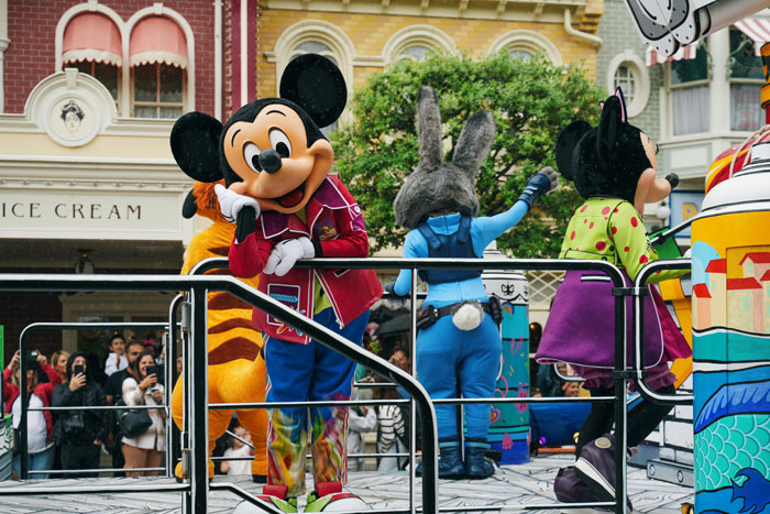 Disney fans rejoice as characters parade in colorful costumes at the park, celebrating new 2025 discounts. Disney fans rejoice as characters parade in colorful costumes at the park, celebrating new 2025 discounts.