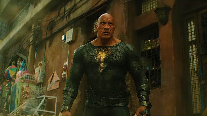 Dwayne Johnson showcasing his impressive transformation in a dark superhero suit ahead of new biopic filming. Dwayne Johnson showcasing his impressive transformation in a dark superhero suit ahead of new biopic filming.