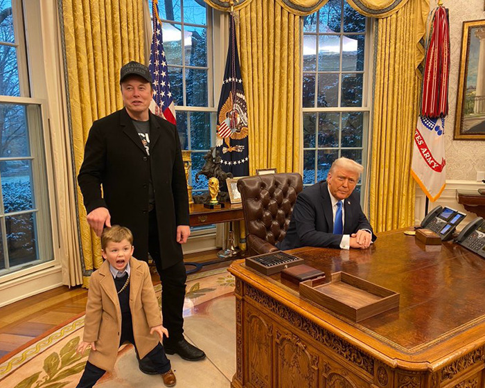 Man in a hat with child, standing in a decorated office next to seated figure. SEO keywords: Elon Musk stepping down DOGE. Man in a hat with child, standing in a decorated office next to seated figure. SEO keywords: Elon Musk stepping down DOGE.