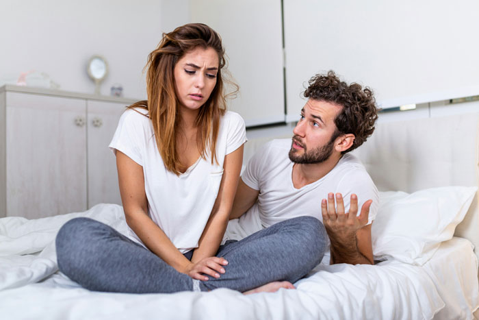A couple having a serious discussion in a bedroom, highlighting a fiancee reconsidering her relationship over a sandwich. A couple having a serious discussion in a bedroom, highlighting a fiancee reconsidering her relationship over a sandwich.