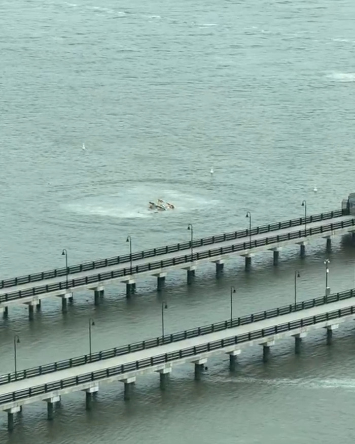 Hudson River crash site with bridge visible, linked to a Navy SEAL pilot incident. Hudson River crash site with bridge visible, linked to a Navy SEAL pilot incident.