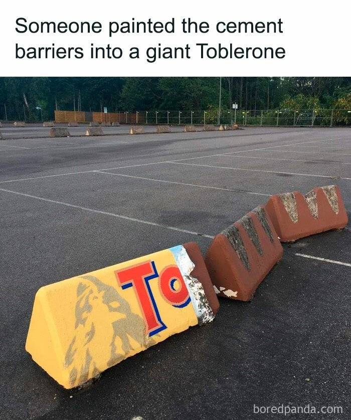 Cement barriers painted to resemble a giant Toblerone, showcasing funny and relatable humor.