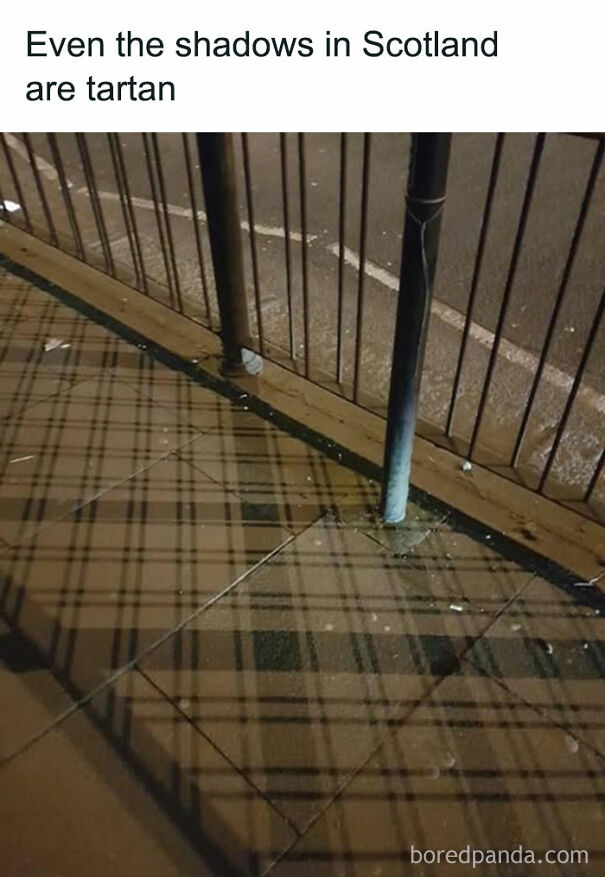 Tartan shadows on Scottish pavement, showcasing Scots' humor.
