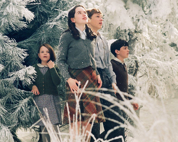 Four children in winter attire stand in a snowy forest scene from the 'Narnia' reboot, sparking gender swap rumors. Four children in winter attire stand in a snowy forest scene from the 'Narnia' reboot, sparking gender swap rumors.