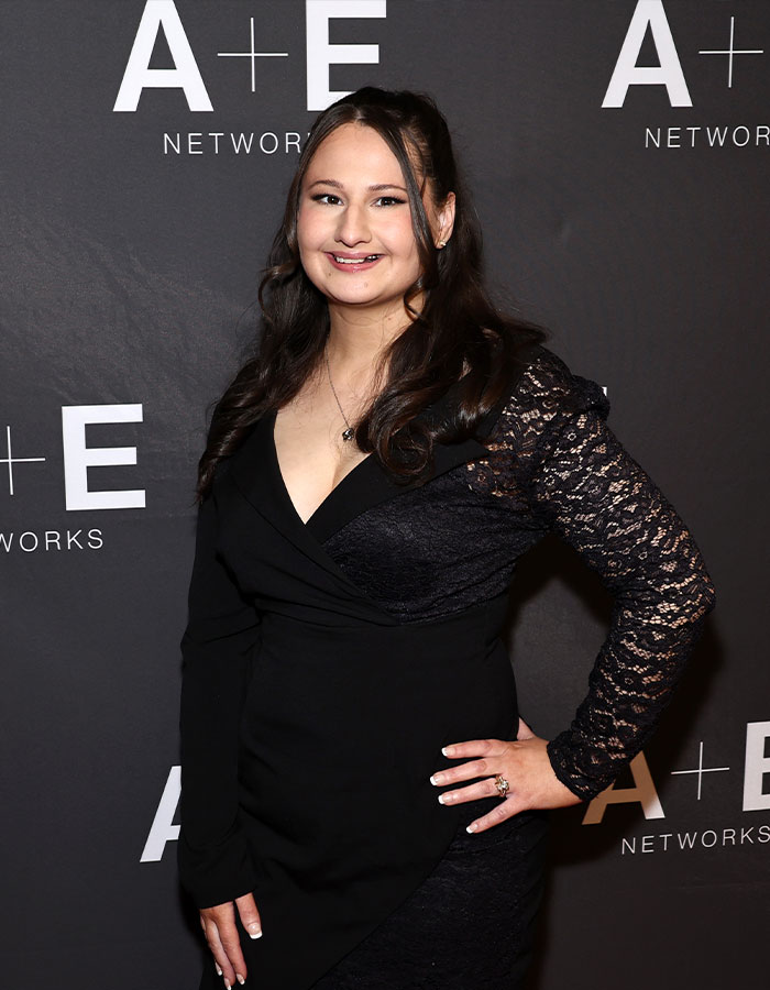 A woman in a black lace dress at an event, highlighted for significant weight loss transformation. A woman in a black lace dress at an event, highlighted for significant weight loss transformation.