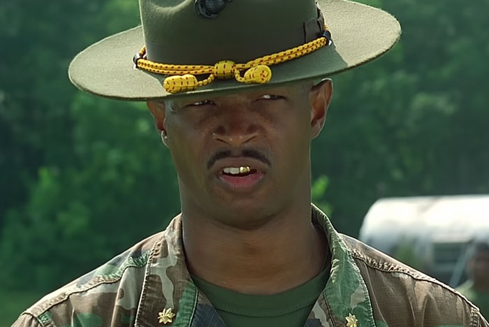 A film legend in a military outfit, possibly portraying a character on set. A film legend in a military outfit, possibly portraying a character on set.