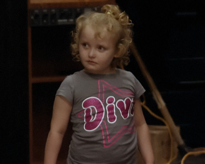 Young girl with curly hair in a "Diva" shirt, related to Honey Boo Boo's life after 'Toddlers & Tiaras'. Young girl with curly hair in a "Diva" shirt, related to Honey Boo Boo's life after 'Toddlers & Tiaras'.