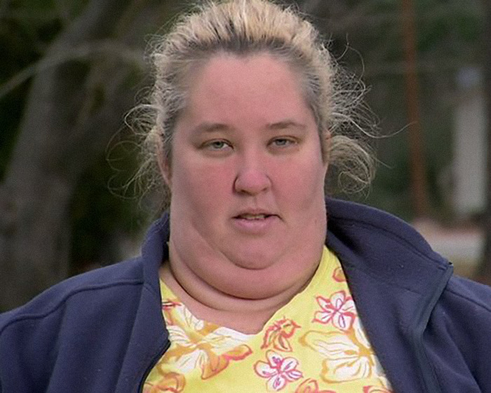 Woman in a floral shirt and dark jacket outside, associated with "Honey Boo Boo" life events. Woman in a floral shirt and dark jacket outside, associated with "Honey Boo Boo" life events.