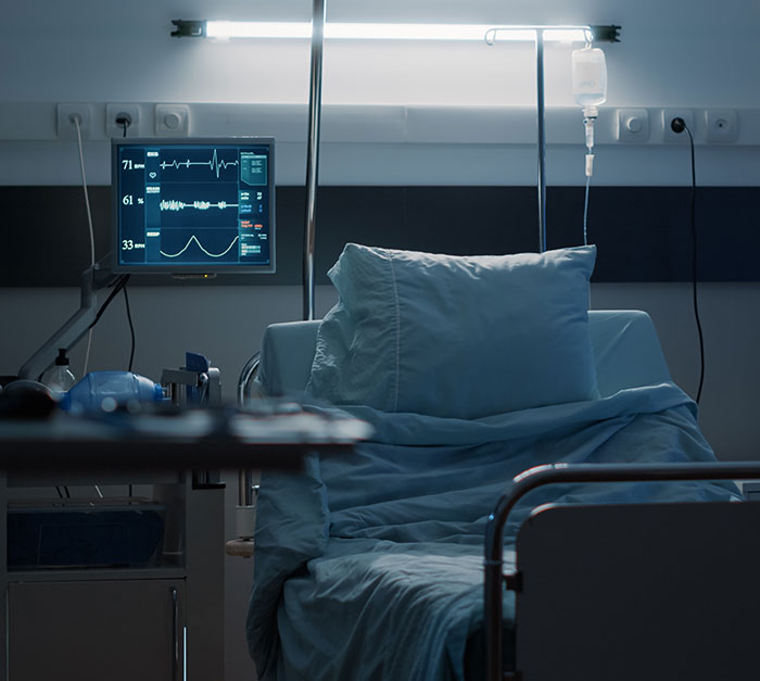 Hospital room with empty bed, medical monitor, and equipment, related to medical students accusation. Hospital room with empty bed, medical monitor, and equipment, related to medical students accusation.