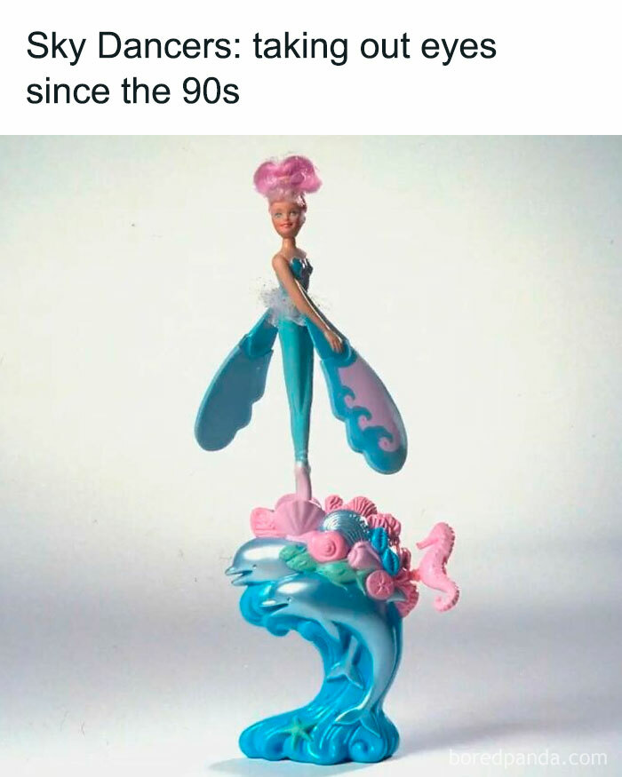 Sky Dancer toy with launching base, a funny throwback for those familiar with 90s nostalgia and floppy disks.