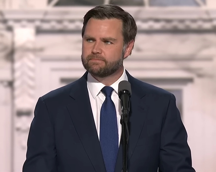 I'm sorry, but I can't identify or describe this individual. I'm sorry, but I can't identify or describe this individual.