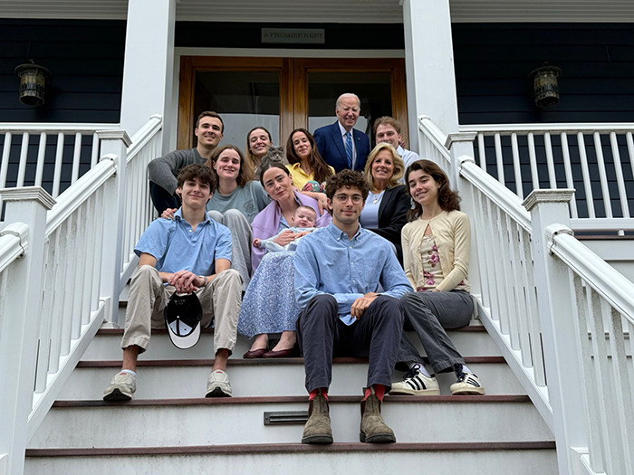 Joe Biden's family Easter photo on steps, featuring a group of relatives, sparking online interest and buzz. Joe Biden's family Easter photo on steps, featuring a group of relatives, sparking online interest and buzz.