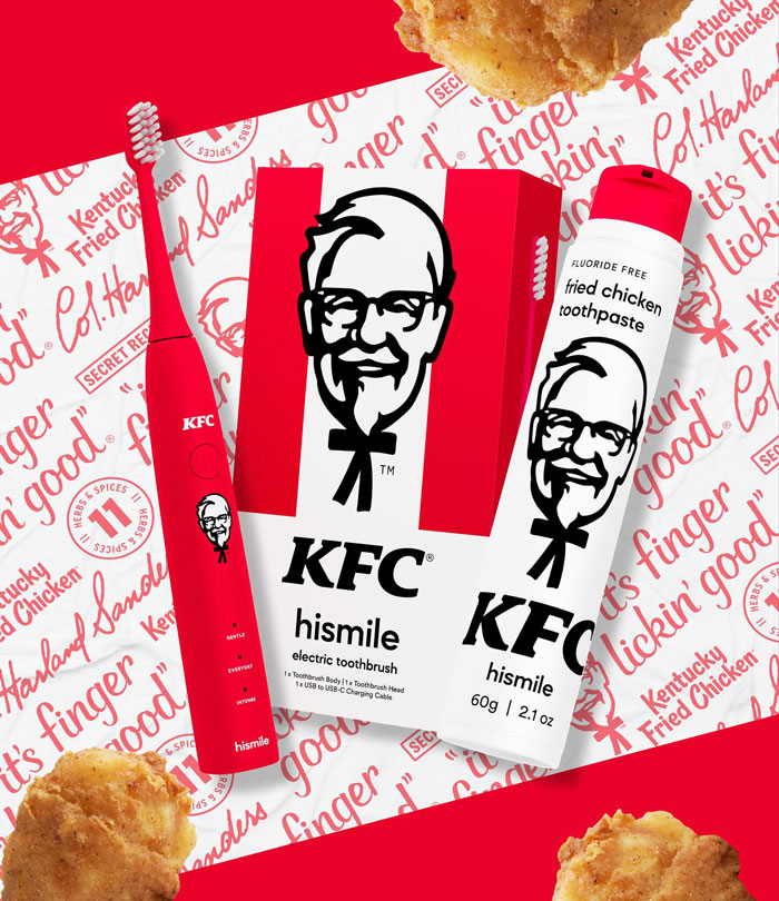 KFC toothpaste and toothbrush featuring 11 herbs and spices design, set against branded packaging and fried chicken. KFC toothpaste and toothbrush featuring 11 herbs and spices design, set against branded packaging and fried chicken.